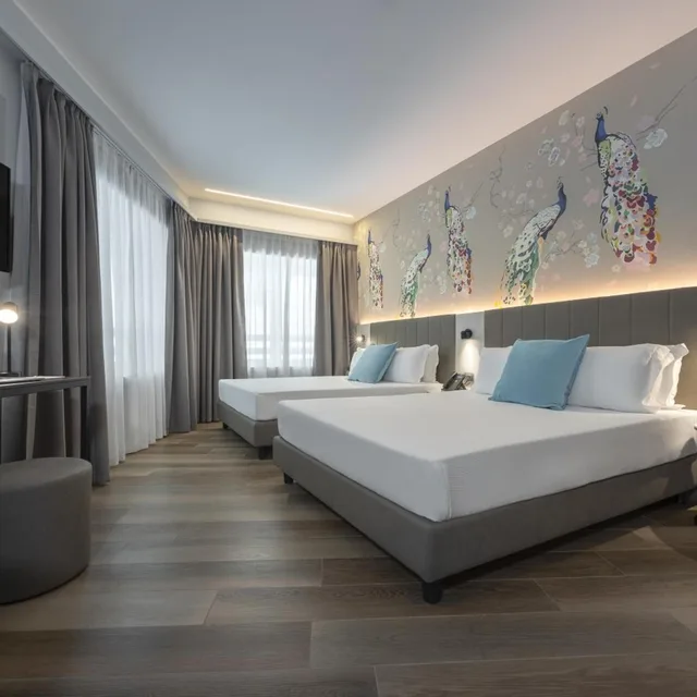 غرفة سوبيريور بسريرين كوين، iH Hotels Milano Centrale 2/10