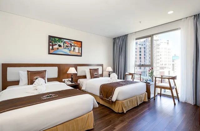 غرفة سوبيريور بسريرين منفصلين بإطلالة جزئية على البحر، Tamarind Hotel Da Nang 6/10