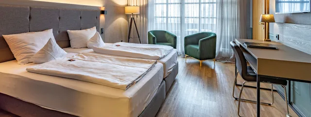 غرفة كومفورت عائلية بسريرين كوين، ACHAT Hotel Waldkirchen 1/10
