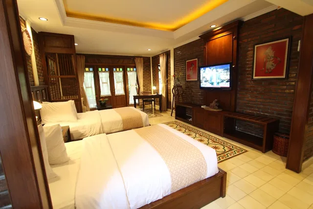 غرفة ديلوكس بسرير مزدوج، Duta Garden Boutique Villa 1/10