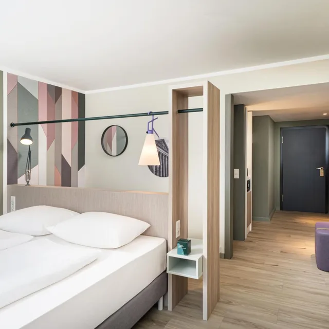غرفة سوبيريور بسرير كينج وسرير كوين، elaya Hotel Stuttgart Ludwigsburg, Trademark by Wyndham 1/2