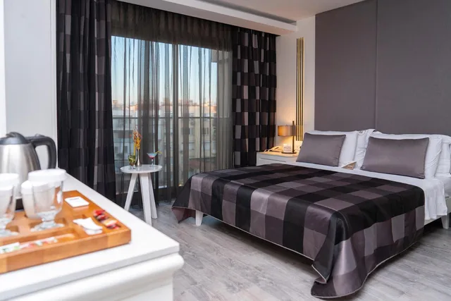 غرفة قياسية بسرير كينج بإطلالة على المدينة، Sky Kamer Boutique Hotel 1/10