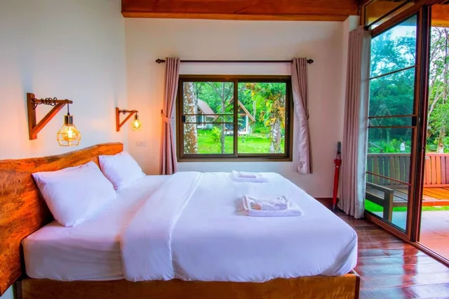 Garden, King Bed, with Fan، Phayamas Private Beach Resort 1/5