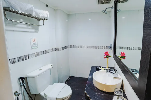 غرفة ديلوكس بسرير كوين للمدخنين، Parkside Star Hotel Waena 3/3