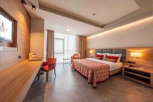 غرفة ديلوكس بسرير كينج وسرير فردي مع أريكة، GRAND ASYA HOTEL 2/10