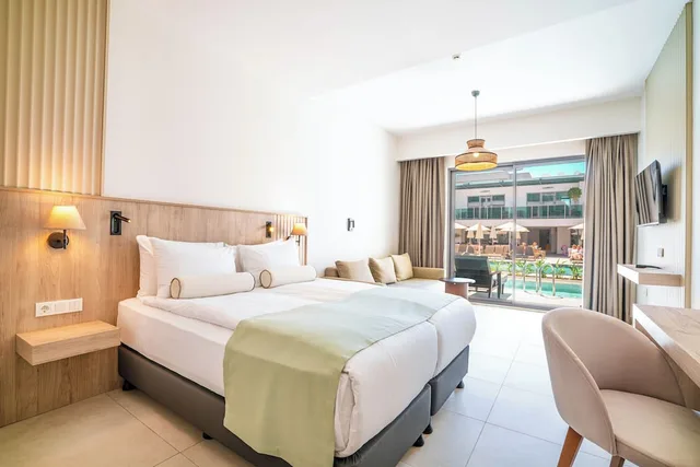 Elite, King Bed, Sofa, Victoria Princess Hotel Side - Adults Only 3/7