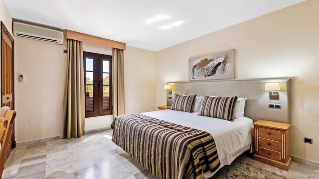 شقة سوبيريور بأربعة أسرّة بشرفة بـ3 غرف نوم مع أريكة، Macdonald Villacana Club Resort 1/4