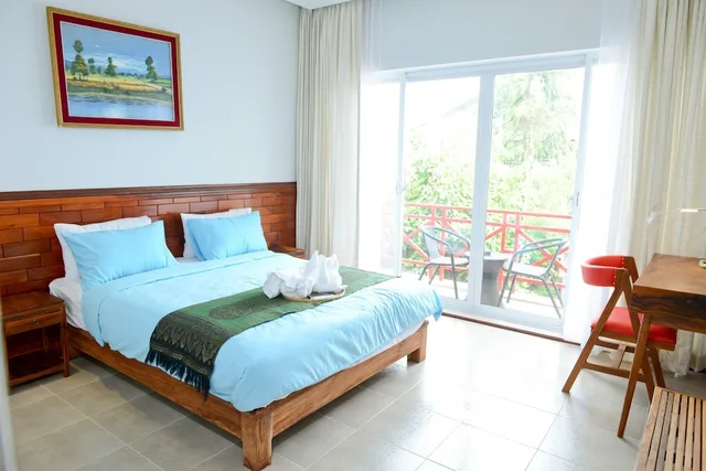 غرفة قياسية بسرير كوين بإطلالة على الحديقة بشرفة، Mowin Boutique Hotel & Residence 1/4