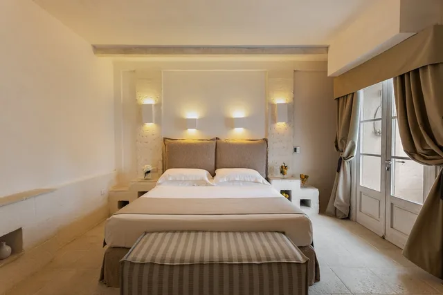 غرفة ديلوكس بسرير كينج، BAGLIONI MASSERIA MUZZA RESORT & SPA 1/3