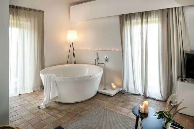 جناح جونيور بسرير كينج مع أريكة بحوض استحمام، Ramo D Aria Etna Boutique Hotel 7/7