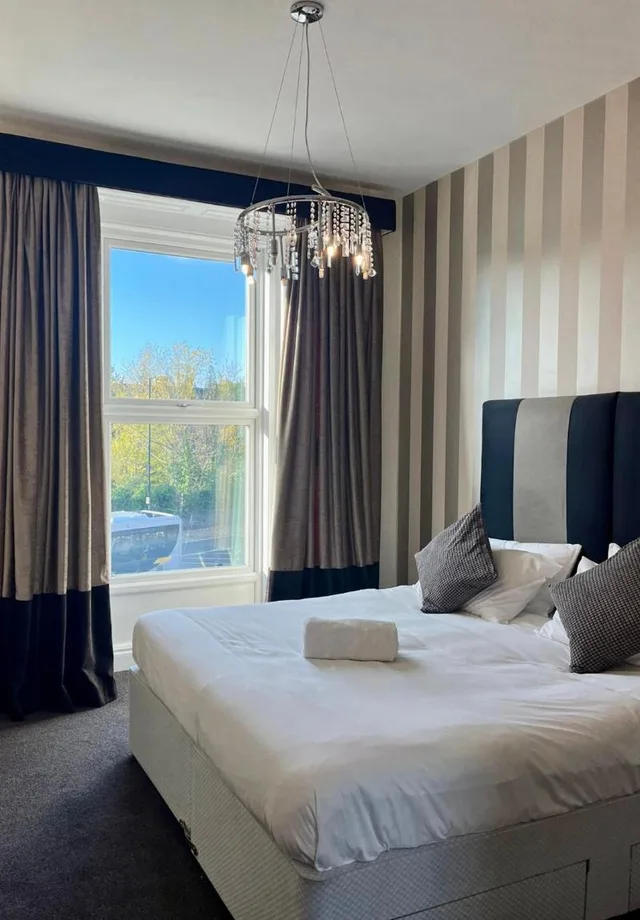 غرفة بسريرين كوين بإطلالة على المدينة، Kensington House Aparthotel by Warren Collection 1/1