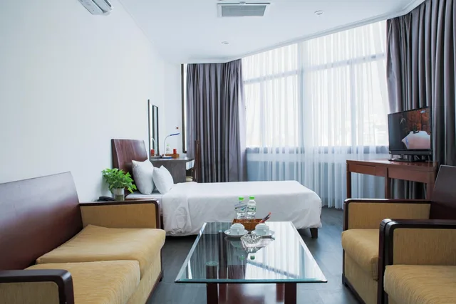 غرفة فاخرة بسرير كوين وسرير فردي، Vung Tau P T Hotel 1/1