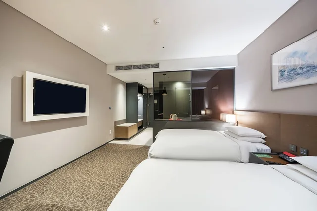غرفة ديلوكس عائلية بسرير مزدوج وسرير فردي بإطلالة على المدينة، ASTI Hotel Busan 3/4