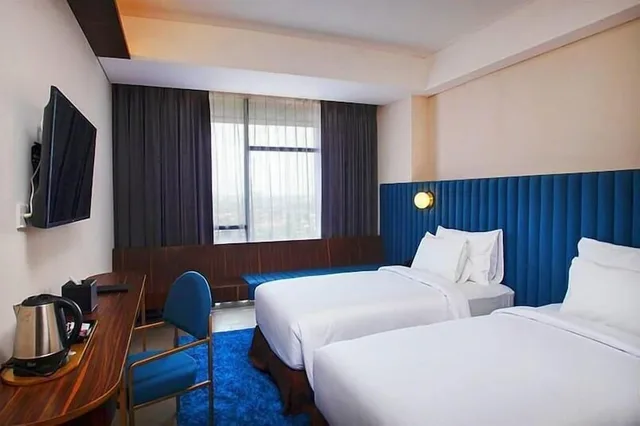 غرفة ديلوكس بسريرين منفصلين، Bono Hotel Pekanbaru 1/1