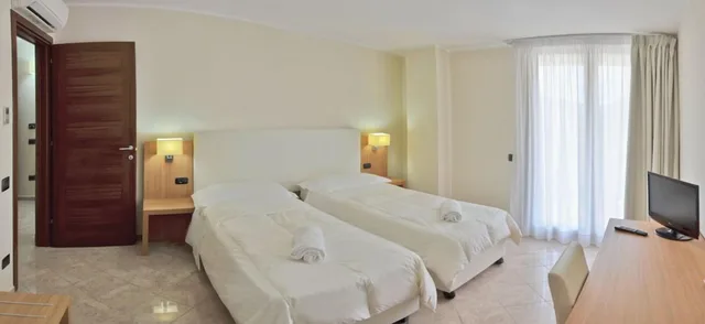 غرفة عائلية بسرير مزدوج وسريرين منفصلين، Vea Resort Hotel 1/6