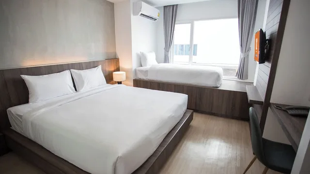 غرفة ديلوكس ثلاثية بسرير مزدوج وسرير فردي، B2 Hat Yai Premier Hotel 2/8