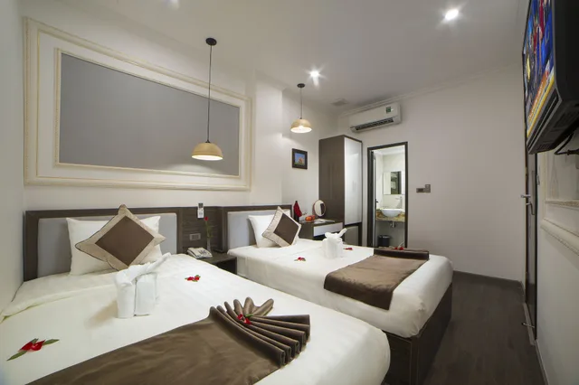 غرفة كلاسيكية ثلاثية بسرير كوين وسرير فردي، Galliot Central Hotel 1/3