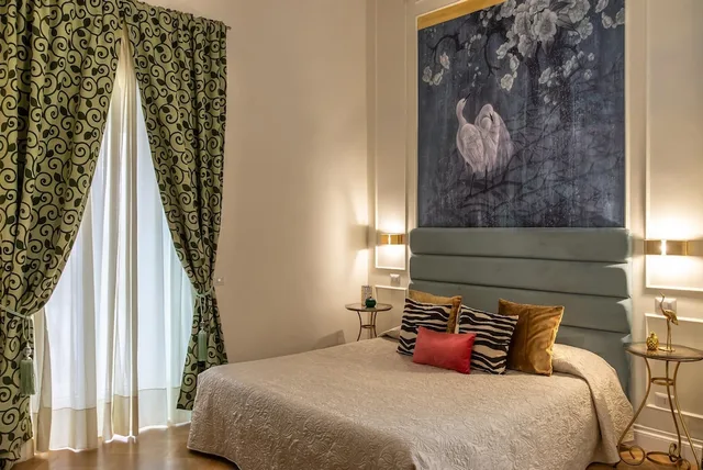 غرفة ديلوكس بسرير كوين بشرفة، Ingrami Suites 1/8