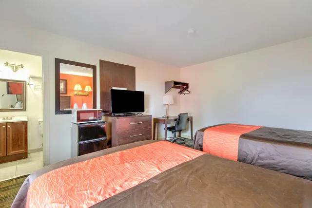 غرفة ديلوكس بسريرين مزدوجين، OYO Palm Leaf Motel 3/7