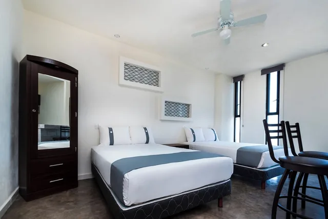 غرفة ديلوكس بسريرين مزدوجين، Capital O Hotel Joyma Suites, San Luis 4/7