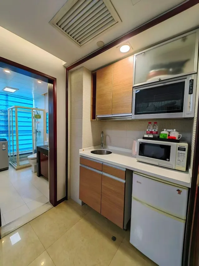 جناح عائلي بسرير كينج وسرير فردي، East King Business Hotel 7/9