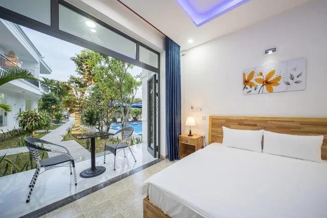 غرفة ديلوكس بسرير مزدوج بإطلالة على الحديقة، Tran Family Villas Boutique Hotel 2/2