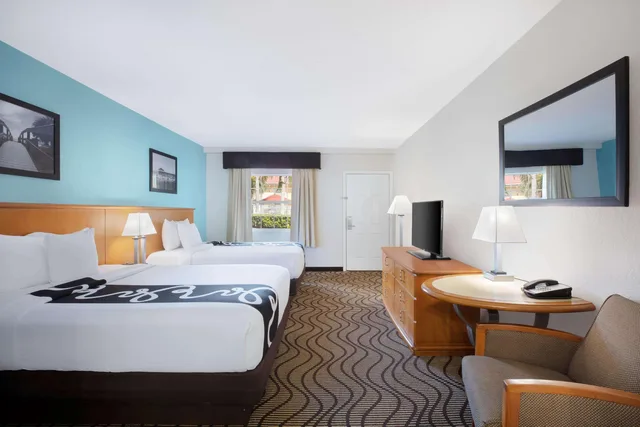 Deluxe, 2 Queen Beds, Pool or Courtyard View, La Quinta Inn By Wyndham Cocoa Beach Port Canaveral 1/3