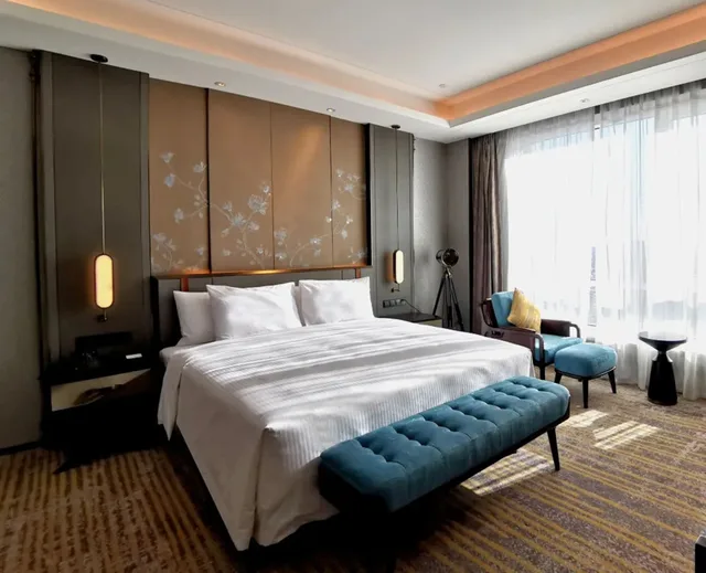 غرفة ديلوكس تنفيذية بسرير كينج، Wanda Vista Changchun 1/2