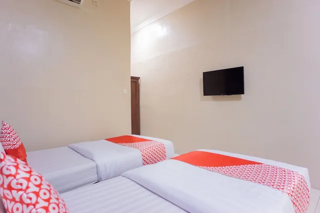 غرفة ديلوكس بسريرين منفصلين، OYO 1636 Wisma Kuta Karang 5/7
