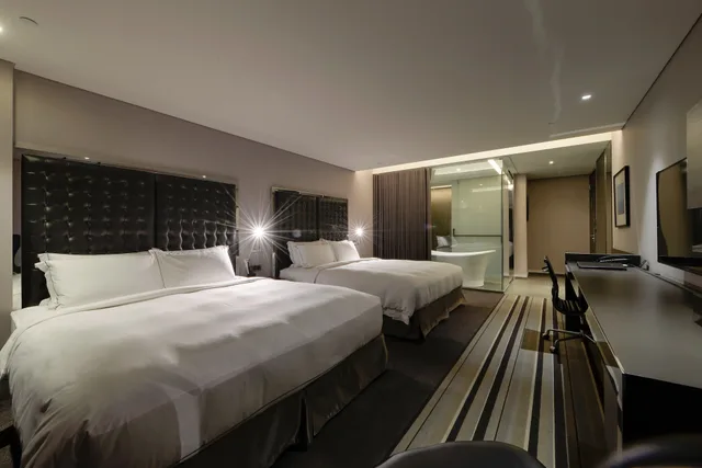 غرفة عائلية رباعية بسريرين مزدوجين، Starhaus Hotel 3/5
