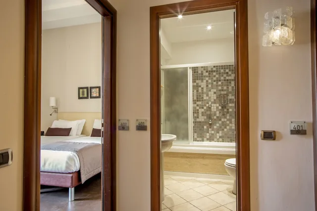 Deluxe, Quadruple, Queen and Twin Beds, Basilio 55 Rome 4/4