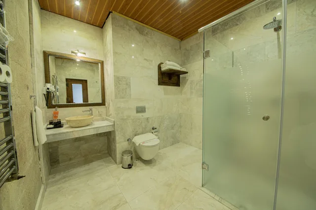 غرفة جونيور بسرير كينج وسرير فردي، Roma Cave Suite Hotel 9/10
