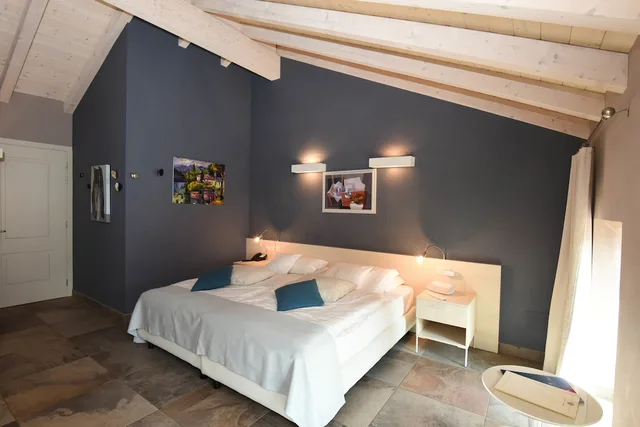 غرفة ديلوكس بسرير مزدوج بإطلالة على البحيرة، Relais Villa Porta 6/10
