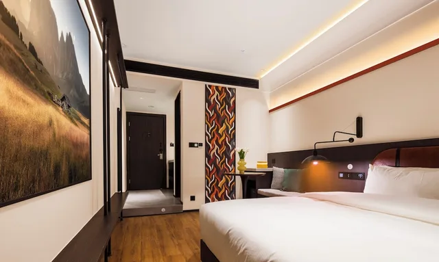 Basic, Queen Bed, No Window، Merica Hotel -Chongqing Jiefangbei 1/3