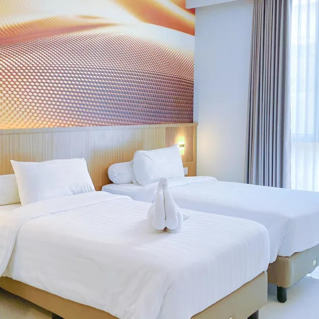 غرفة كبيرة بسريرين منفصلين، Front One Resort Indraloka 3/7