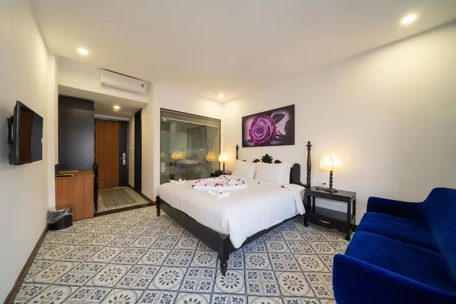 غرفة ديلوكس بسرير كوين بشرفة، Thanh Binh Central Hotel 1/8
