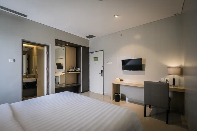 غرفة ديلوكس بسرير كينج بدون إطلالة، Clove Garden Hotel & Residence 1/2