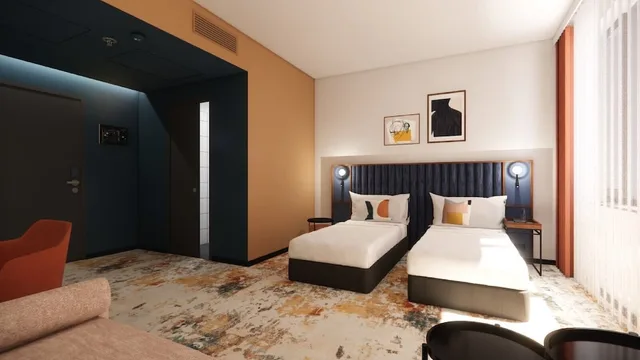 غرفة بريميوم بسريرين منفصلين مع أريكة، D8 Hotel 2/6