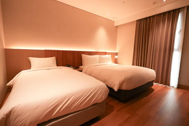 غرفة ديلوكس عائلية بسرير مزدوج وسرير فردي، Busan City Hotel 1/2