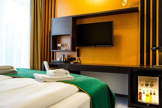 غرفة كومفورت بسرير كوين، M-Pire Hotel 1/2