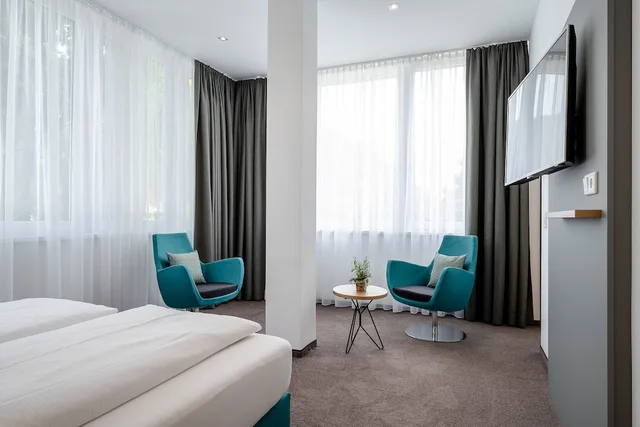 غرفة عائلية بسرير كوين وسريرين فرديين، Avalon Bad Reichenhall 2/5