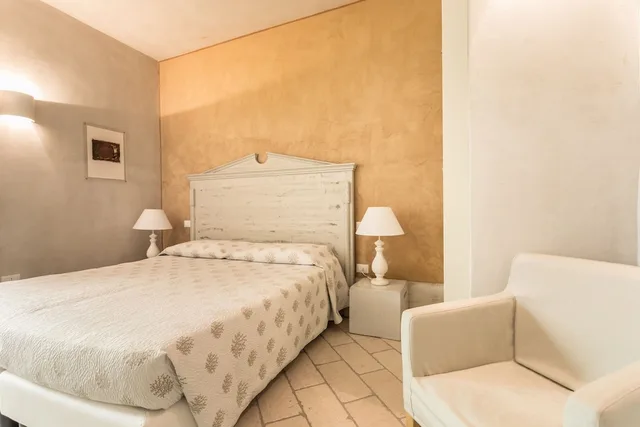 غرفة بسريرين منفصلين مع أريكة في الملحق، Maison Tresnuraghes 4/10