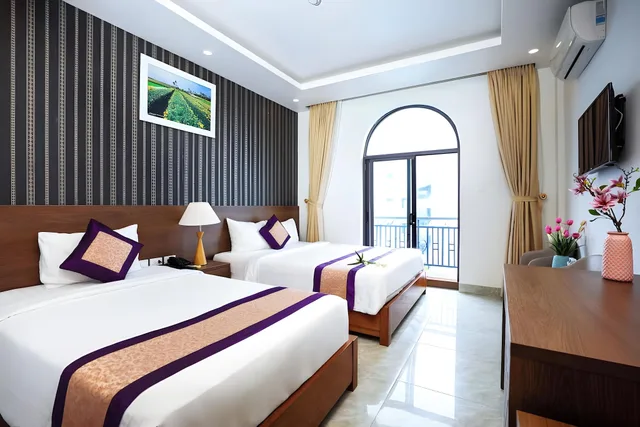 غرفة تنفيذية ثلاثية بسريرين مزدوجين بإطلالة على البحر، Luxor Hotel Phu Quoc 2/2