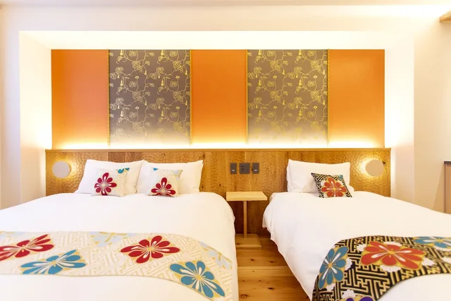 غرفة ديلوكس عائلية بفراش فوتون وسرير فردي وسرير كوين، Hotel Kanazawa Zoushi 2/6