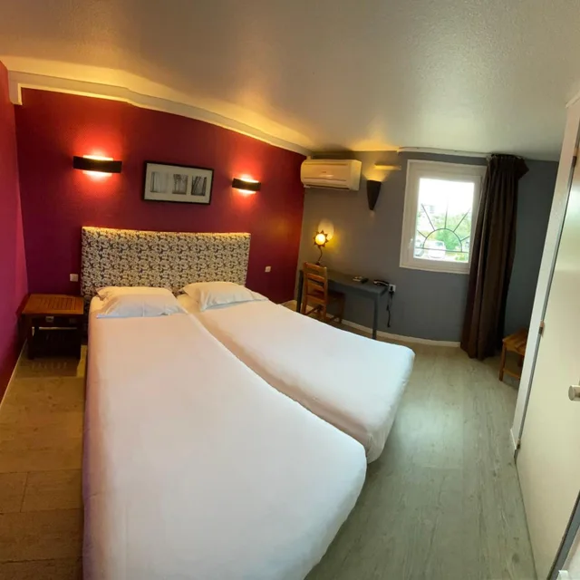 غرفة بسريرين منفصلين، LE SUD HOTEL 1/7