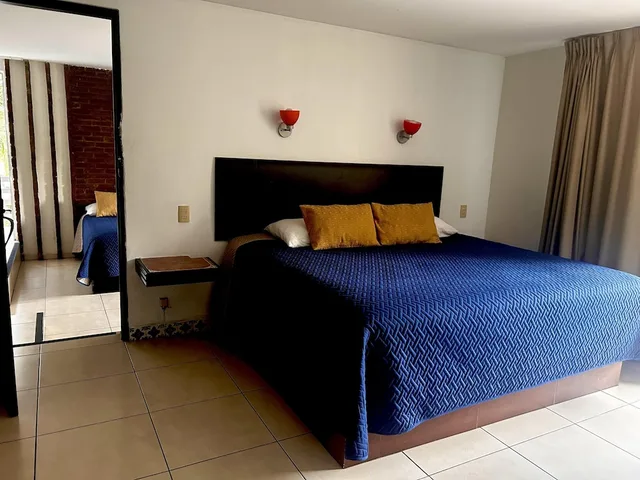 غرفة جونيور بسرير كينج وسريرين مزدوجين بغرفتي نوم، VF Villa Florencia Hotel 1/6