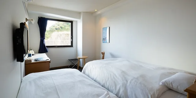 غرفة اقتصادية بسريرين منفصلين بإطلالة على البحر، Hotel Season Nichinan 1/1
