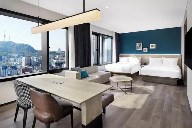 غرفة بريميير رباعية بإطلالة على المدينة، Four Points by Sheraton Josun, Seoul Myeongdong 1/2