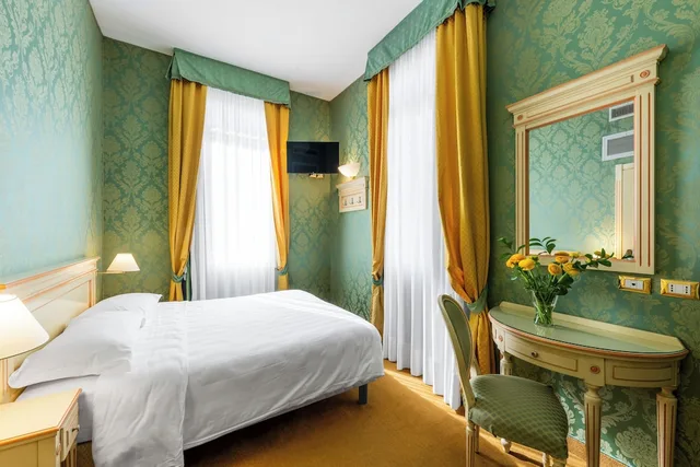 غرفة كلاسيكية ثلاثية بسرير كوين مع أريكة، Hotel Villa Delle Palme 5/10