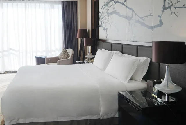 غرفة تنفيذية بسريرين منفصلين، Howard Johnson by Wyndham Changsheng Plaza Meizhou 2/3